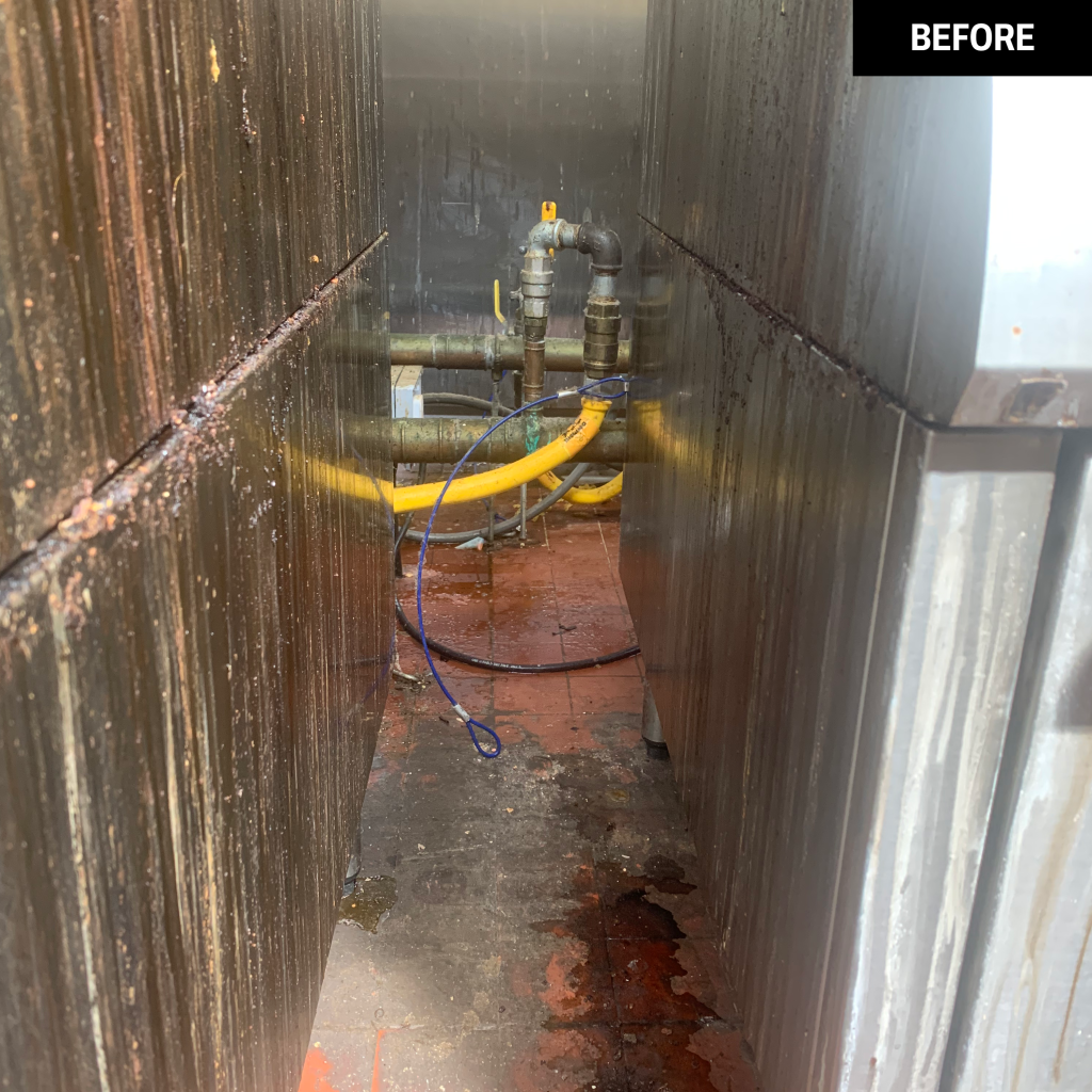 A kitchen floor before a Trojan FM clean