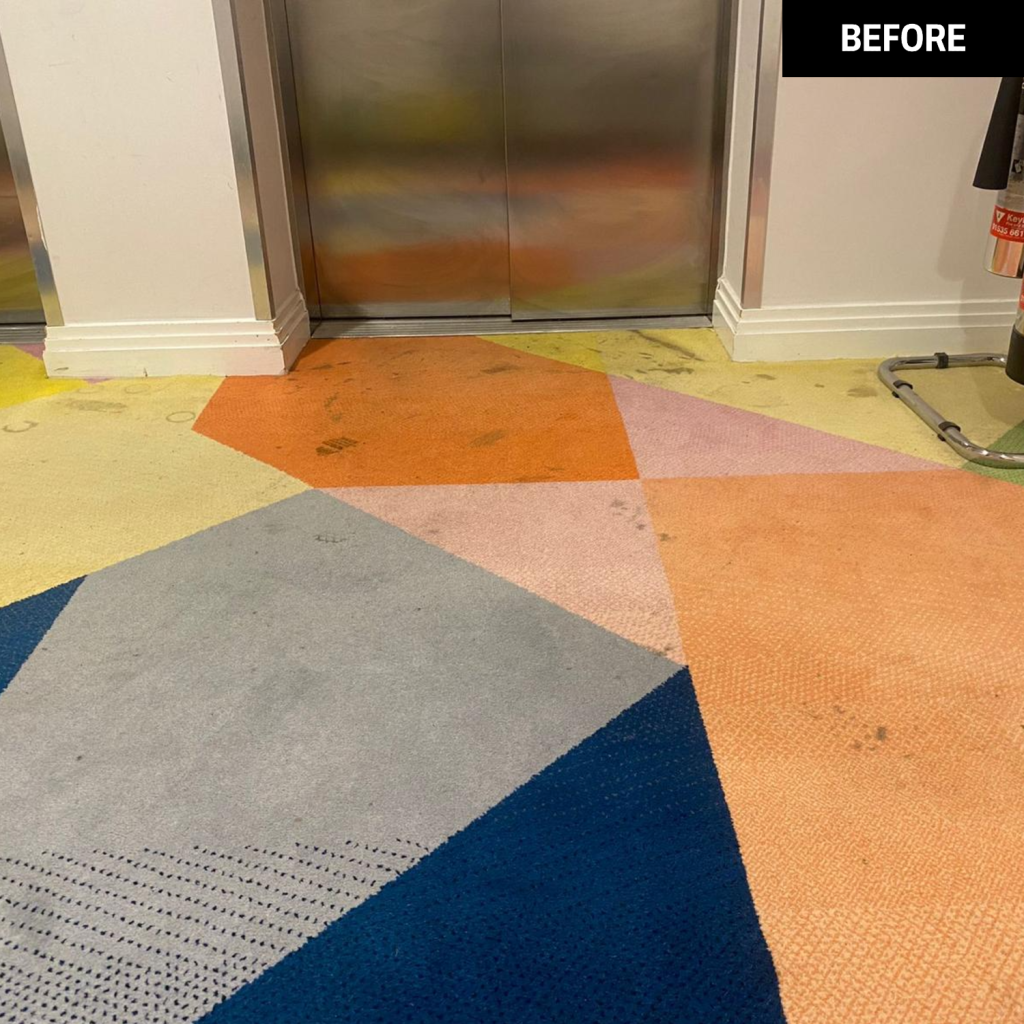 A carpet before a clean by the Trojan FM team